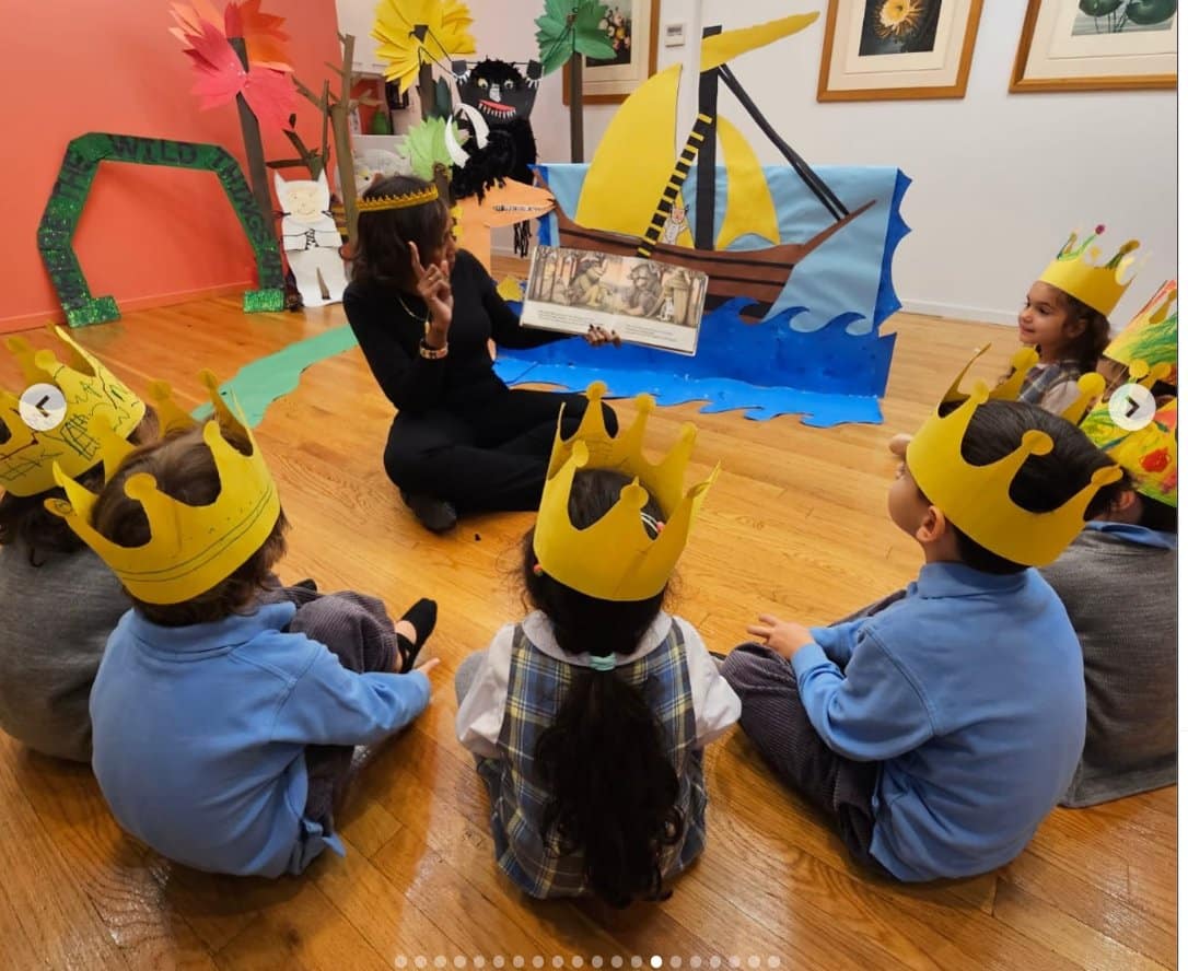 Children in crowns listening to a story